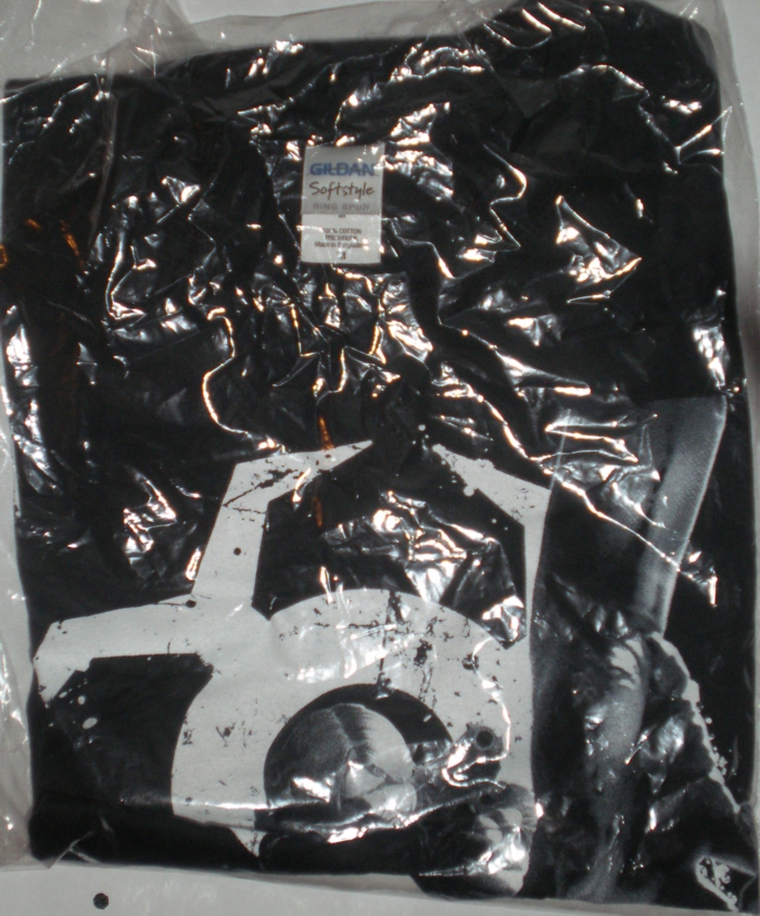 Folded black T-shirt, side 1