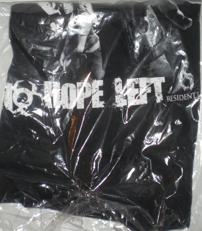 Folded black T-shirt, side 2