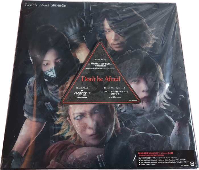 Front in plastic sleeve with stickers, human angle
