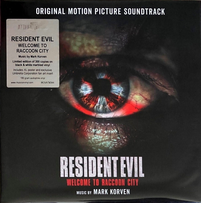 Front in plastic sleeve with sticker Front in plastic sleeve with sticker