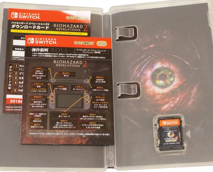 Inside of case with cartridge, manual, and DLC sheet