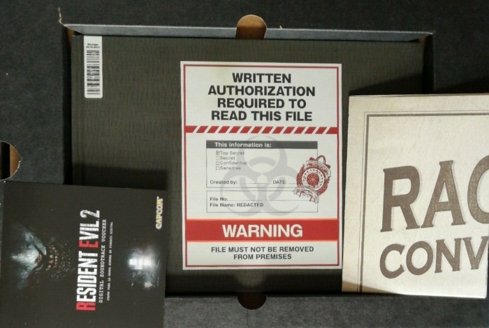 Soundtrack voucher, artbook, and poster